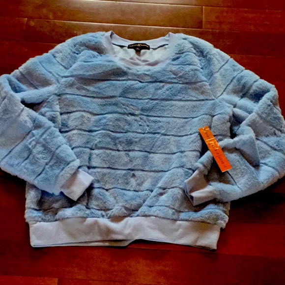 blue fuzzy sweatshirt